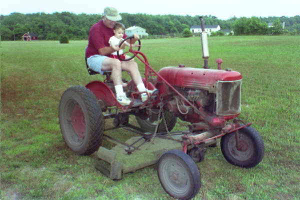 Noel & Ian on a tractor
